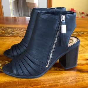 Black, zip up, open heel shoes